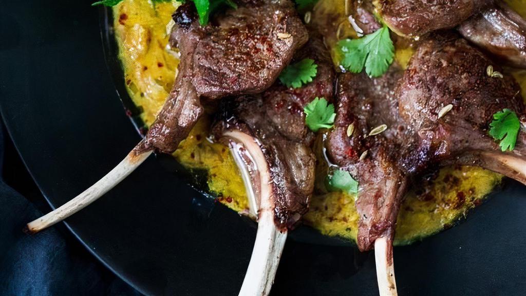 Lamb Chops · Fresh lamb chops marinated in chef's special sauce and barbecued in clay oven on a skewer.