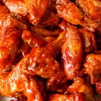 Wings · Smoked and charred tossed in your choice of buffalo, way hot, bbq, abita turbo bbq, orange h...