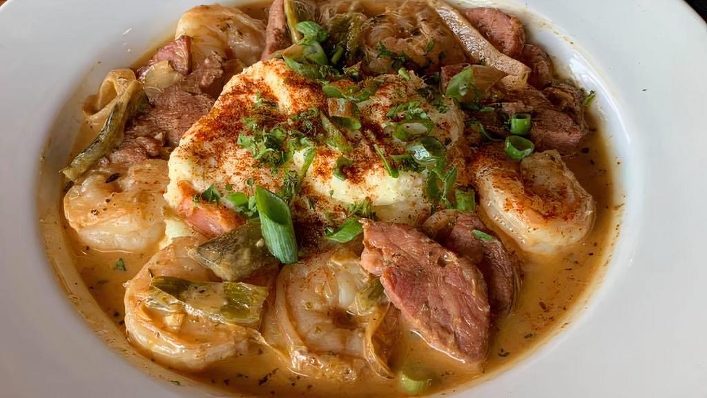 *Voodoo Shrimp & Grits [Gf] · Andouille sausage, poblanos, caramelized onions, voodoo cream sauce. Gluten free *consumer advisory; consuming raw or undercooked meats, poultry, seafood, shellfish, or eggs may increase your risk of foodborne illness, especially if you have certain medical conditions.
