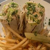Chicken Caesar Wrap · Grilled Chicken Breast, Romaine Lettuce, Croutons and Caesar Dressing. Wrapped in a Warm Flo...