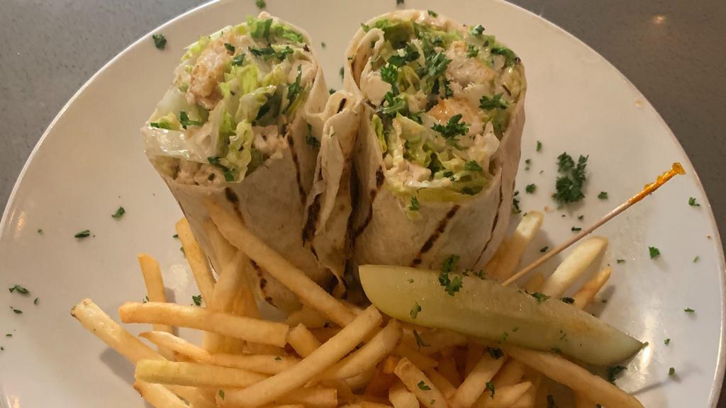 Chicken Caesar Wrap · Grilled Chicken Breast, Romaine Lettuce, Croutons and Caesar Dressing. Wrapped in a Warm Flour Tortilla