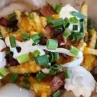 Loaded Fries · Crinkle-cut fries, aged cheddar jack cheese, sour cream, chopped bacon & scallions (1130 CAL.)
