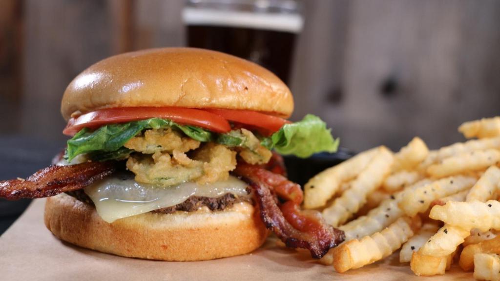 Double Jalapeno Cheese Burger · Jalapeño cream cheese, Swiss, Applewood bacon, fried jalapeños, Utah sauce, lettuce, tomato on a butter brioche bun served with crinkle-cut fries (1790 CAL.)