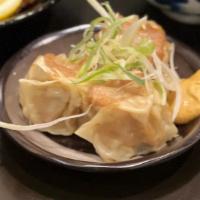 Chicken Shumai · Sweet and Savory steamed chicken dumplings with Japanese hot mustard.