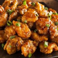 General Tso'S Chicken · Spicy. Chunk chicken lightly fried with hot bean sauce. Served with white rice.