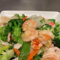 Club Seafood · Crabmeat, jumbo shrimp, fresh scallops, and lobster meat deliciously sautéed with assorted C...