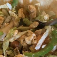 Taco Salad Fajita · Crispy flour bowl, with your choice of chicken or beef slices, grilled with onions, bell pep...