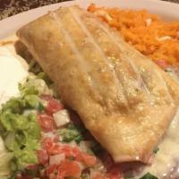 Chimichanga · One flour tortilla stuffed with your choice of spicy chicken or beef chunks and then fried. ...