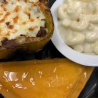 Stuffed Pepper · A green bell pepper stuffed with Certified Angus Beef Philly cheese steak, peppers, onions, ...