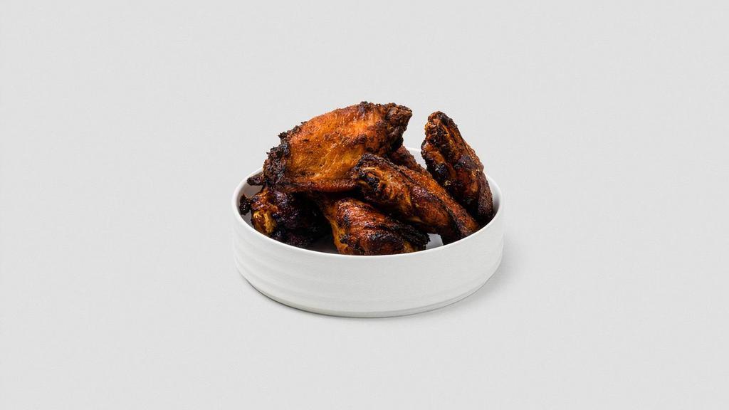 Smokey Chicken Wings · Smoked, flash fried and dry rubbed . Allergens: dairy, egg