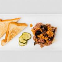 Pulled Pork. · Half pound of smoked, pulled pork shoulder served with Texas Toast and pickles. Allergens: w...