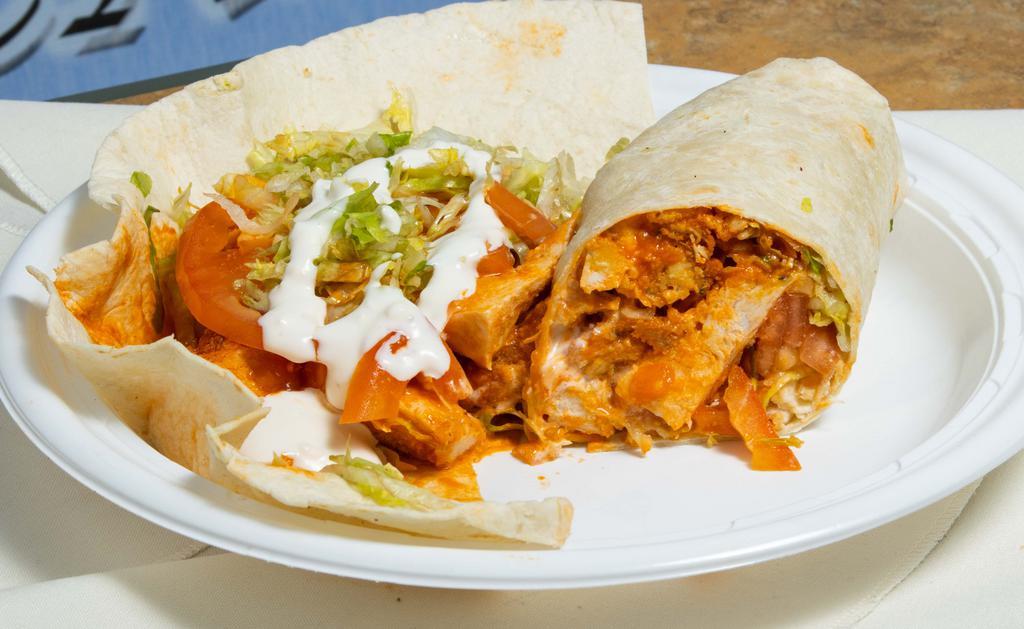 Buffalo Chicken Wrap · Homemade Crispy Buffalo Chicken Cutlet Topped with Lettuce, Tomato and Dressing of Your Choice in a Wrap
