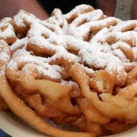 Funnel Cake · Served with strawberry or chocolate dipping.