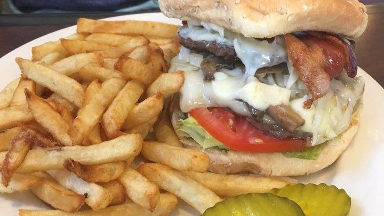 Geneva Burger Lunch Special · Burger with mushrooms, onions, peppers and cheese served with fries. Consuming raw or undercooked meats, poultry, seafood, shellfish, or egg may increase your risk of foodborne illness, especially if you have certain medical condition.