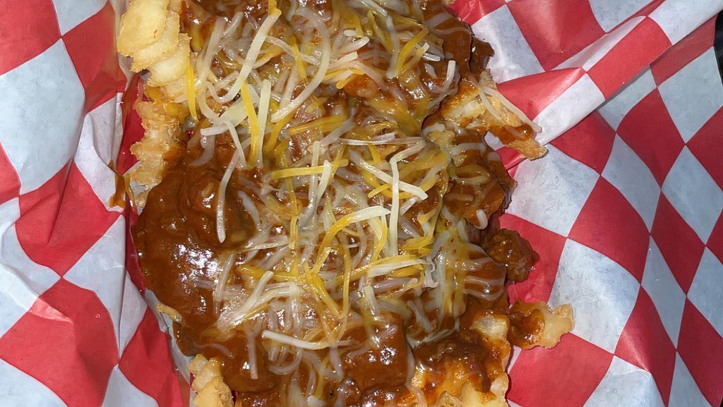 Sham'S Chili Cheese Fries · Golden French fries, with Cheddar cheese and chili.