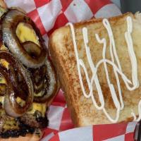 Paytie'S Patty Melt · 1/4 pound seasoned patty with cheese and grilled onions, on grilled Texas toast.