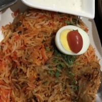 Chicken Biryani · Chicken, basmati rice, mild spices.