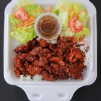 Spicy Pork Bulgogi · Korean style spicy pork with rice, salad & homemade dressing