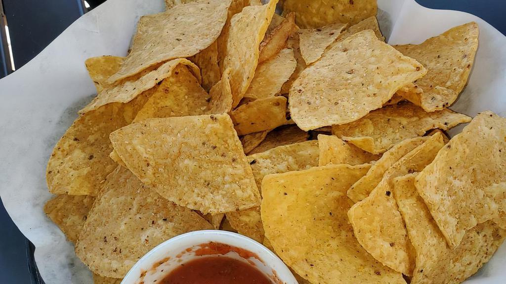 Homemade Tortilla Chips · Served with salsa.