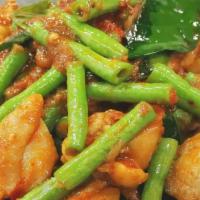 Pad Prik Gang / ผัดพริกแกง (Spicy Green Beans) · Seafood or choice of meat in Red curry. This Red curry is sautéed with Fresh green beans and...