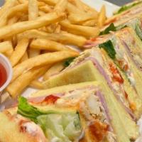Club Sandwich · Chicken, ham, mozzarella cheese, lettuce, tomatoes and mayo.