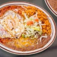 Enchilada Plate With Meat · Your choice of red or green chile. smothered in chile con carne. served with refried beans a...