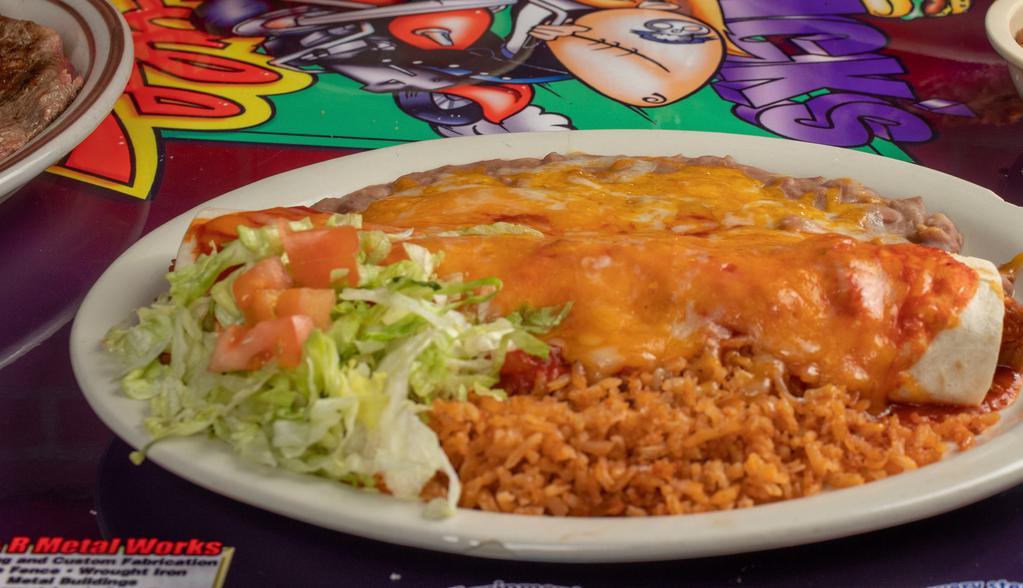 Burrito Plate · Chile con carne burrito smothered. served with your choice of red or green chile refried beans and rice.