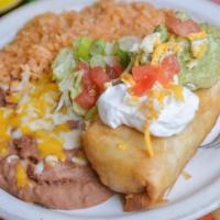 Chimichanga Combination · Your choice of chimichanga topped with guacamole and sour cream served with rice and beans.