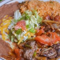 Fajita Combination · Seasoned steak or chicken grilled with onions, bell peppers, jalapeños and tomatoes, topped ...