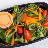 House Salad · Mixed greens with cherry tomatoes, carrots, and choice of Italian or ranch dressing.
