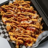 Loaded Chicken Fries · Our delicious tender chicken soaked in buttermilk and tossed in our famous rosemary seasonin...