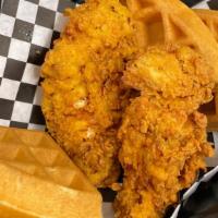 Chicken And Waffle Plate · 1 Belgian waffle, two buttermilk chicken tenders with a side of syrup.
