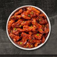 Fiery Tenders · Three vegan crispy tenders, tossed in our house wings sauce, with your choice of dipping sau...