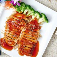 Chicken Teriyaki · Marinated in a delicate special teriyaki sauce. Served with a choice of miso soup or green s...
