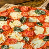 Pizza Margherita · Fresh sliced roma tomatoes, fresh basil, fresh chopped garlic, with fresh mozzarella rounds ...