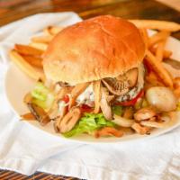 Chef'S Special Burger W/ Fries · Juicy beef burger, caramelized onions and mushroom, American cheese, lettuce tomatoes and ma...