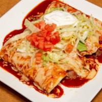 Enchilada Suprema · A supreme combination with a chicken enchilada, a bean enchilada, a cheese enchilada, and be...