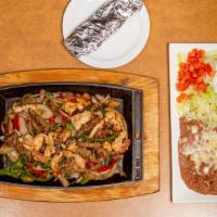 Shrimp Fajitas · Bell peppers and onions served with, sour cream, tree flour tortillas and choice of rice or ...