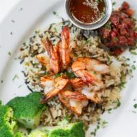 Rosemary Shrimp Skewers  · Marinated in garlic-lime olive oil and served with tuaca butter and pomodori.
