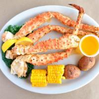 King Crab Clusters · Seasonal item. 1 Lb. total served with corn and potatoes.