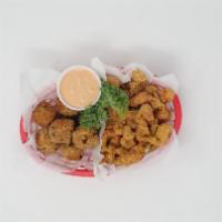 Sampler Basket (Choice Of 2) · Choice of 2: Fried Sliced Mushroom, fried pickels, curly fries, hush puppies, fried jalapeno...