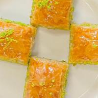 Baklava · Rich sweet pastry made of layers of filo filled with chopped walnut and sweetened and held t...