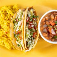 Taco Plate · Choose any two tacos with your choice of two sides.