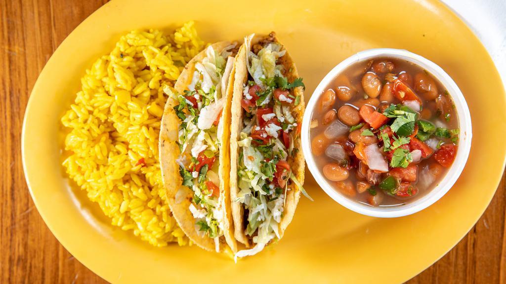 Taco Plate · Choose any two tacos with your choice of two sides.