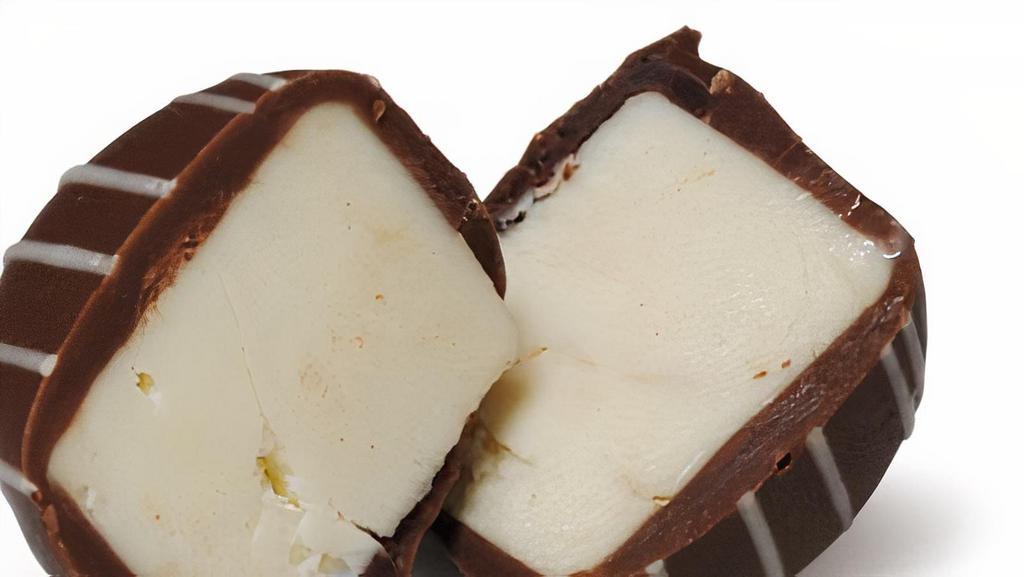 Champagne Truffle (1/2 Lb), Item (43109) · A champagne-flavored white chocolate center worthy of its own toast