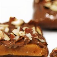Almond Toffee Bar (1/2 Lb), , Item(43100) · Perfectly sized bars of buttery almond toffee covered in rich chocolate & sprinkled with alm...