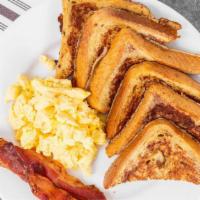 French Toast · Three slices of batter dipped Texas toast served with two scrambled eggs and your choice of ...