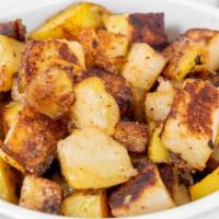 Home Fries · Griddled soft yukon potatoes seasoned with salt & pepper
