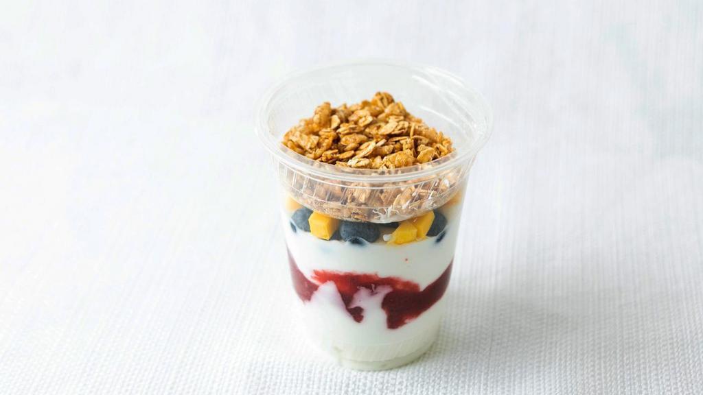 Yogurt Parfait · Individual cup of Greek vanilla yogurt topped with fresh berries and granola