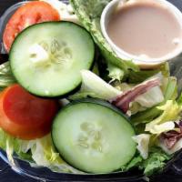 Side House Salad · Mixed greens, tomato, cucumber, croutons, choice of dressing.